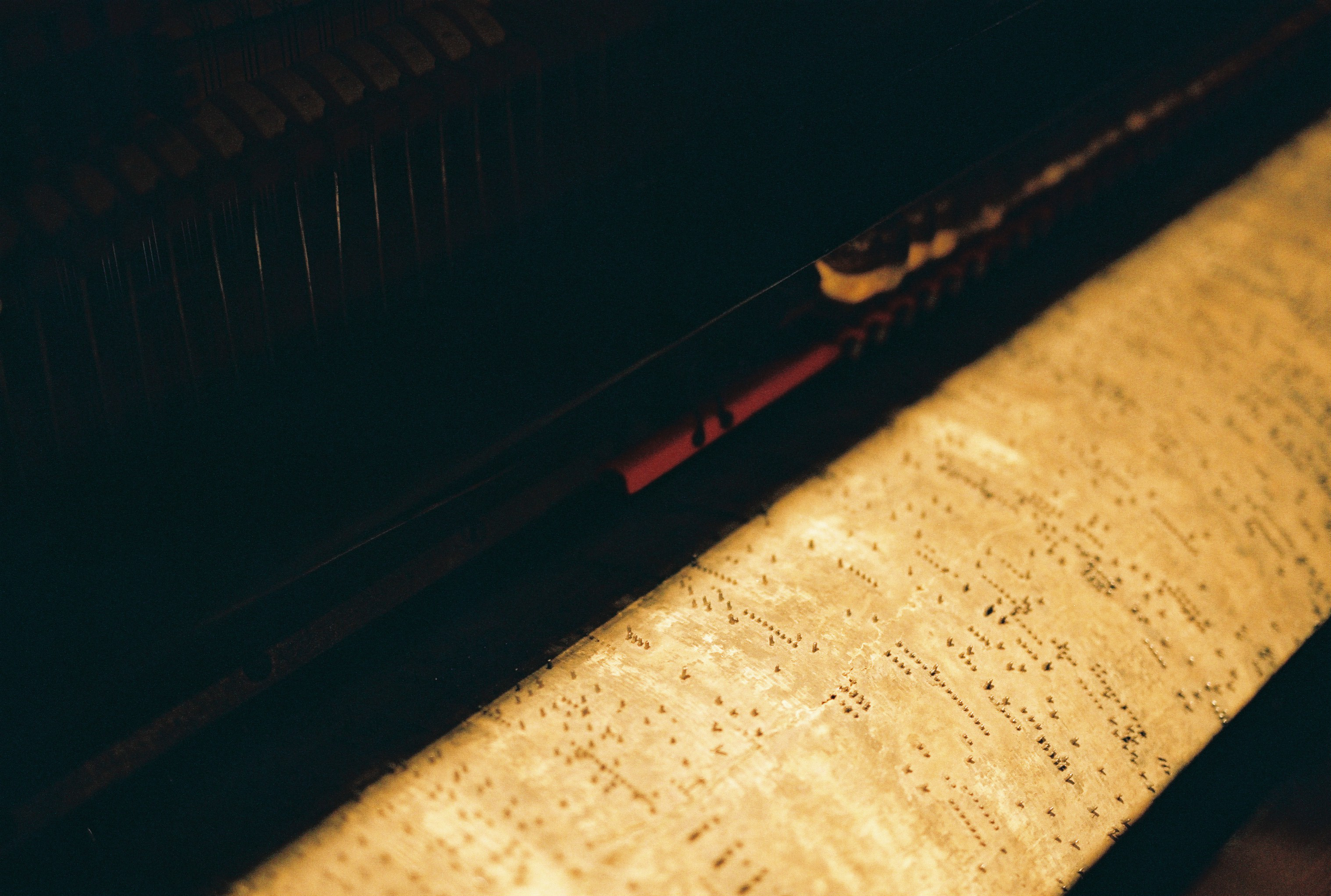 Music Box — macro detail: pin comb pluck